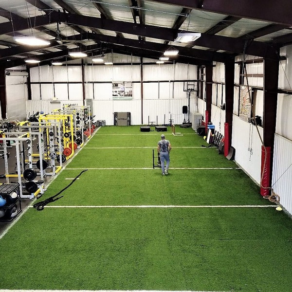 Athletic Body mechanics facility showing weights and ropes